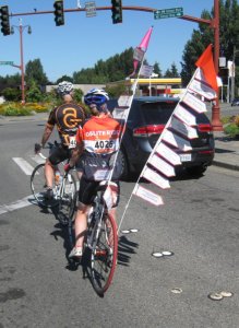 This woman had flags on her bike showing everyone she's riding for. I guess she's not concerned about aerodynamics.